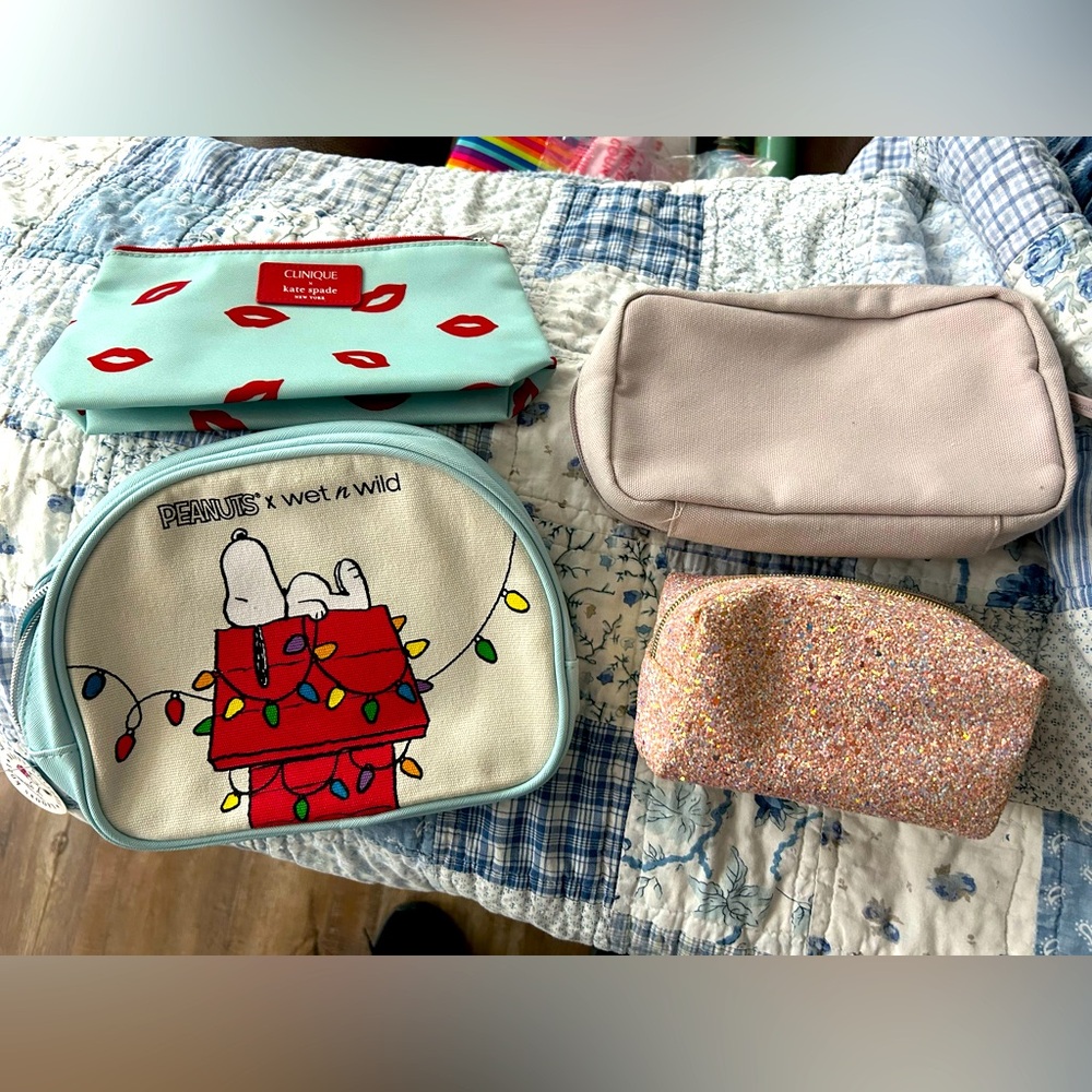Peanuts, Kate Spade. Bath and Body Works, and Bare Mineral Cosmetic Bags